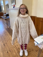 Holly is modelling a  beautiful cable sweater made by her gran, Gwenda