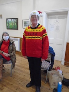 Chris Morris is modelling the lovely, festive Christmas sweater she made. The sweater was designed by Chris, knitted in the round using yarn from her stash. 