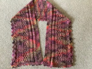 Jenny Crisp knitted this scarf using hand dyed silk and Marino yarn, bought in Wonder wool 2 years ago.