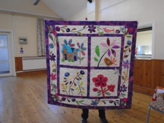 This lovely appliquéd quilt Barbara has called Home and Garden