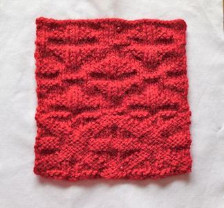 Jan Clark knitted this lovely block called Woven Triangles for our wall hanging