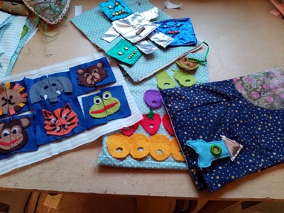 This is the third “busy book” Evelyn has made, one for each of her grandson’s.  They are full of exciting, colourful and unique pages that will hopefully keep Drew busy for hours.