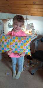 Caroline gave her grandaughter Rosa a lesson on the overlocker and she made a cushion very pleased with herself