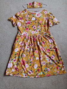 A dress I've made for my daughter. The matching face mask may be a step too far! Evelyn