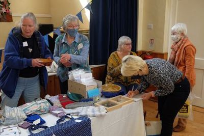 Shiela, Jenny and Heather buying, Julie and Pat buying