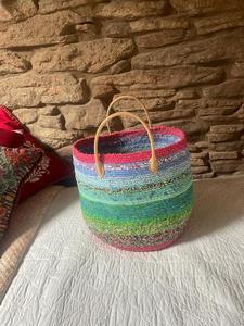 Basket made by Christine Boyd using fabric covered clothes line.  She made it for her friend Ginny and gave it to her when she went to stay with her in Canada 