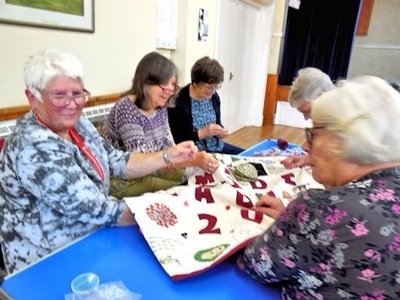 Sylvia, Evelyn, Christine, Rosemary and Celia finishing the 2020 quil