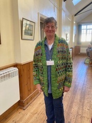 Chris models the fabulous cardigan she spun and then knitted