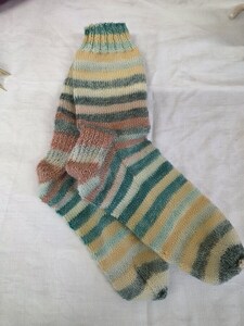 Traditional Christmas present of socks for her daughter by Anne