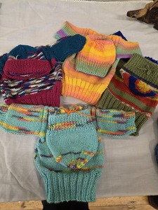 Fish and chip outfits created for newborns in South Africa.  WI collect and send,  Maggie has the pattern.