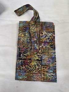 Jackie - travel bad with pockets for passport, phone etc